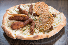 CHICKEN N‘ WAFFLES PIZZA cinnamon toast crunch fried chicken, italian waffle cookies, granny smith apples, maple syrup, white sauce, mixed herbs 17/23