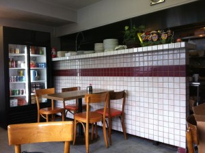 Interior Shot 1: Two Tables and Eight Seats