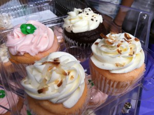 Clockwise (L-R): Guava, Royal Purple Velvet and two Passion Fruit and Haupia Cupcakes from Hella Cupcakin